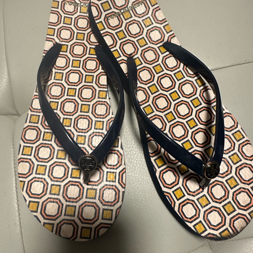 Geometric Pattern Flip Flops With Navy Straps - image 1